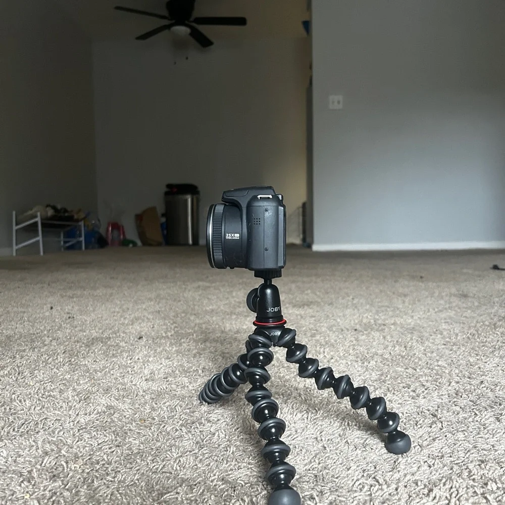Black Camera with Flexible Tripod